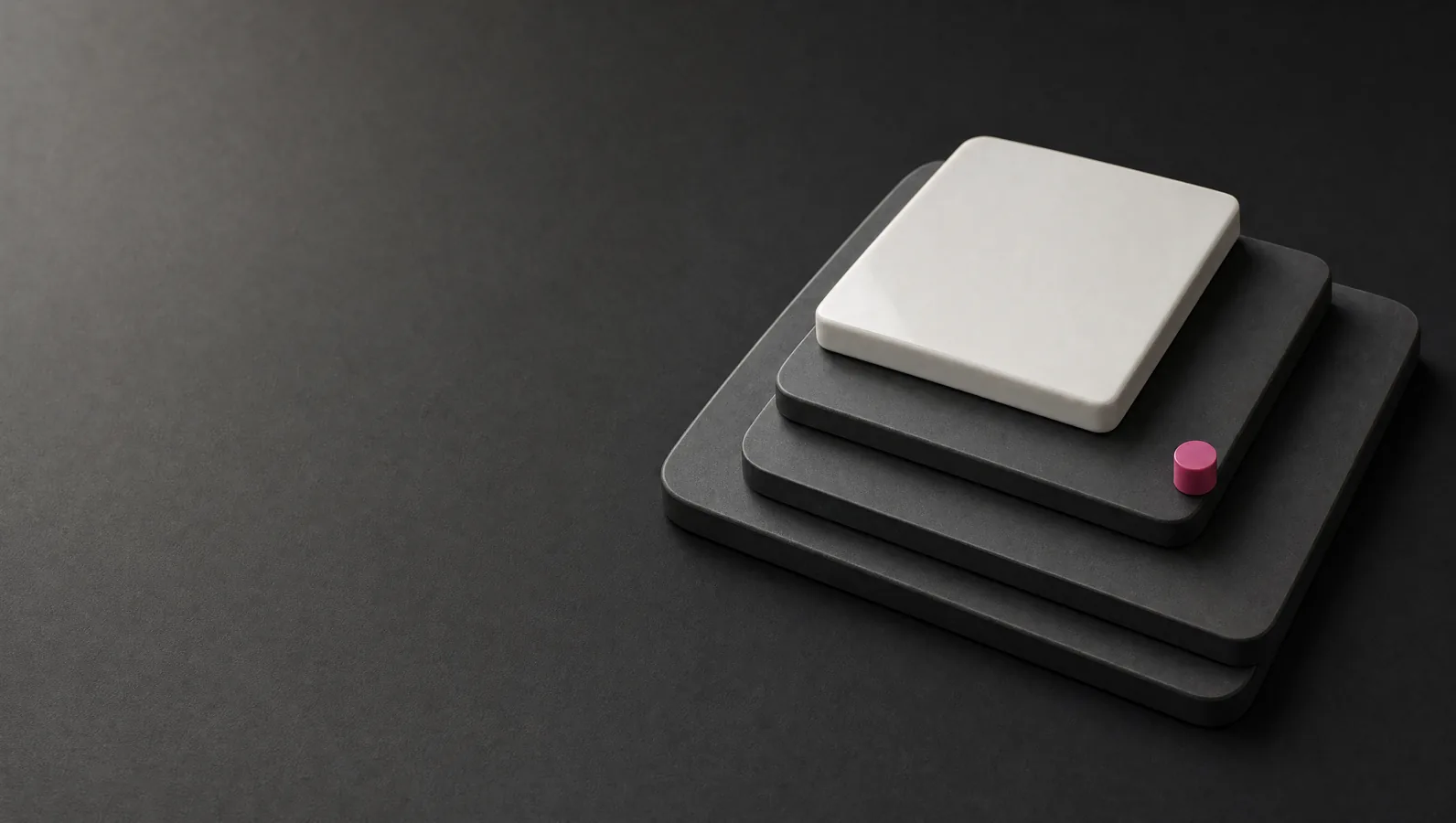 Abstract white ceramic and graphite components, a visual study for the Decodation studio